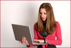 girl looking at laptop